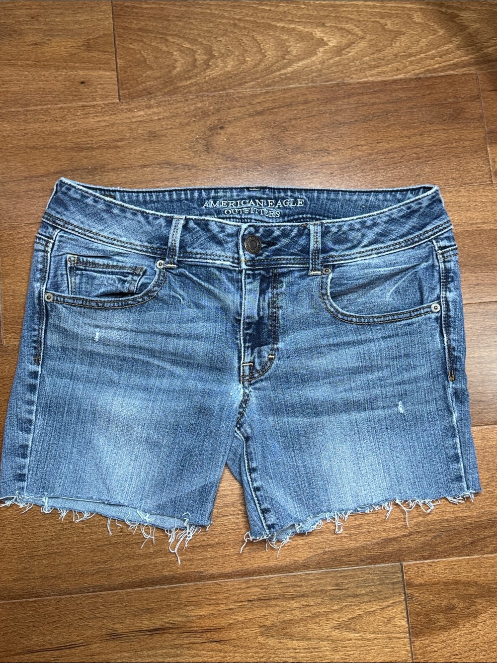 AMERICAN EAGLE Medium Blue Distressed Denim Cutoff Shorts